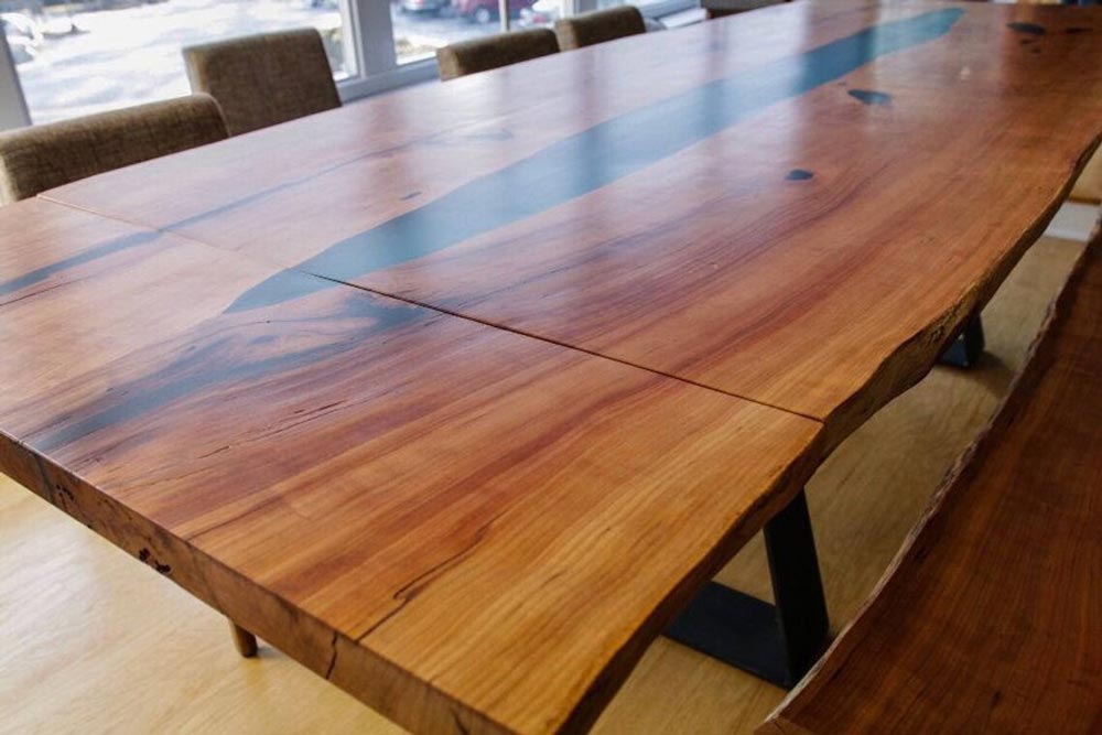 Extendable epoxy dining table