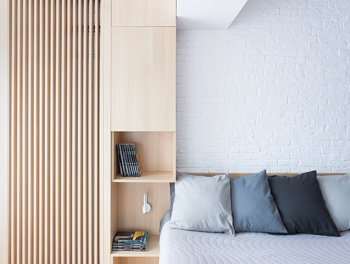 Modern bedroom design with modern furniture in a stylish, functional apartment in Bucharest by Rosu-Ciocodeica