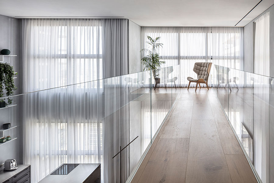 Small reading and relaxing area in a bright duplex in Israel