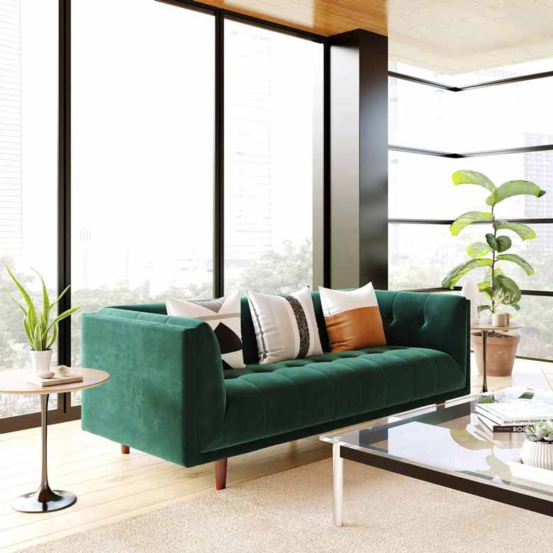 This green velvet sofa features an eye-catching design with a vintage vibe, perfect for making a bold statement in the living room