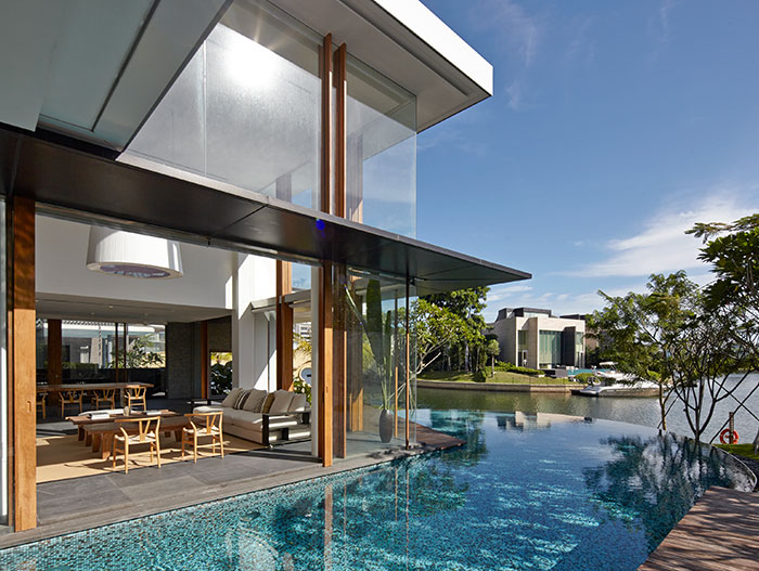 Stunning Sentosa Cove, Singapore home with gorgeous swiming pool by Robert Greg Shand Architects