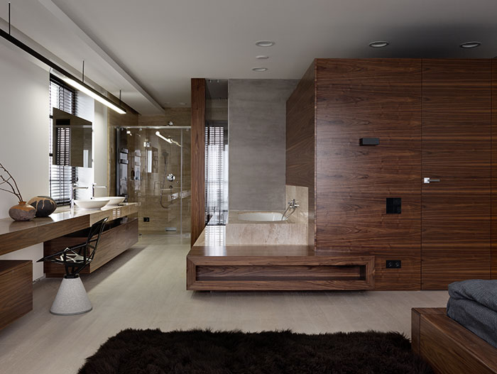 Incredible bedroom with ensuite bathroom with gorgeous neutral color palette that's a joy to behold