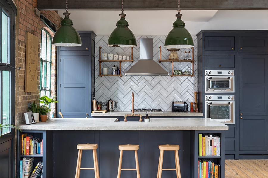 Industrial kitchen design idea in a renovated penthouse located in London