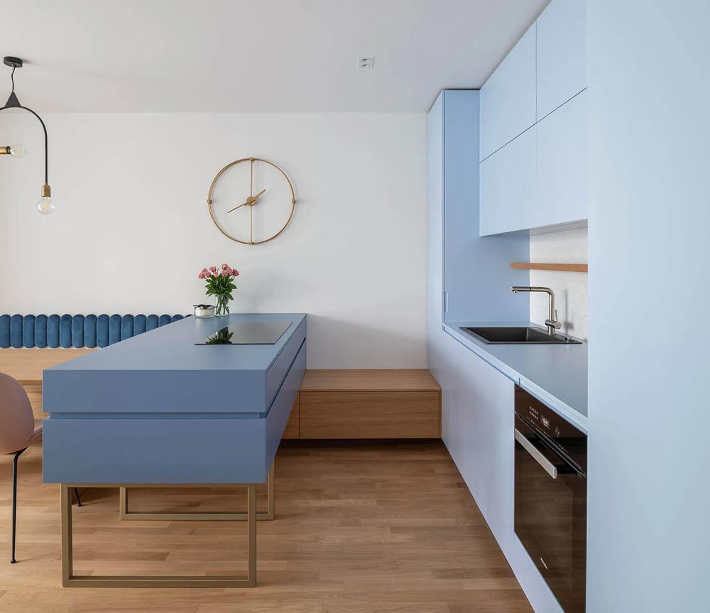 Modern minimalist kitchen with light blue cabinets idea - two shades of blue were used for this kitchen renovation