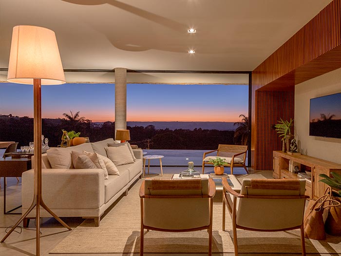 House of Stones in Franca, Brazil - living room designed by mf+arquitetos with amazing mountain views