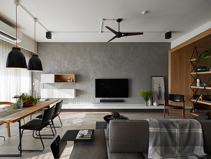 Open-space dining and living area of an inviting apartment in Taiwan