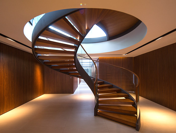 Secret Garden House: Amazing spiral staircase in a contemporary home in Singapore by Wallflower Architecture + Design