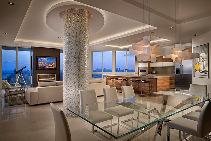 Luxurious kitchen, dining and living area in a breathtaking penthouse in Miami Beach by Pepe Calderin Design