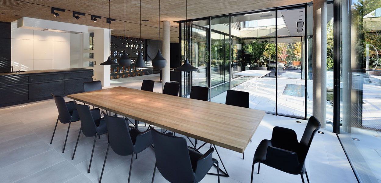 Stylish dining room design and stunning outdoor area of a luxurious villa in Vienna, Austria