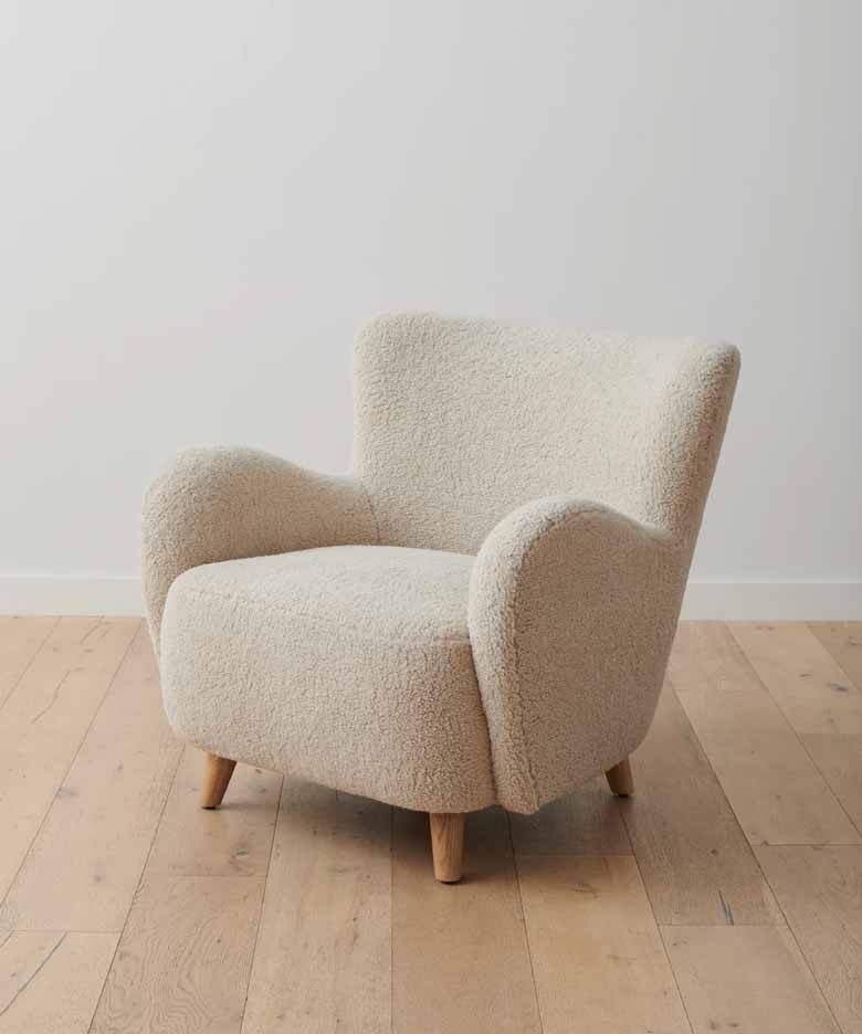 Luxury soft sherpa chair with solid White Oak legs
