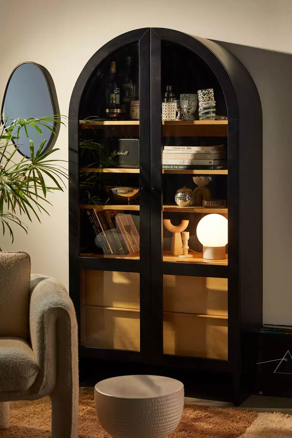 Mason black storage cabinet - this arched black cabinet from Urban Outfitters is perfect for keeping your home organized