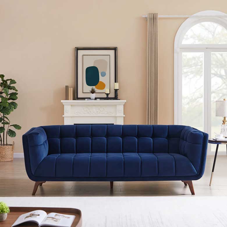 Mid-century modern blue velvet sofa
