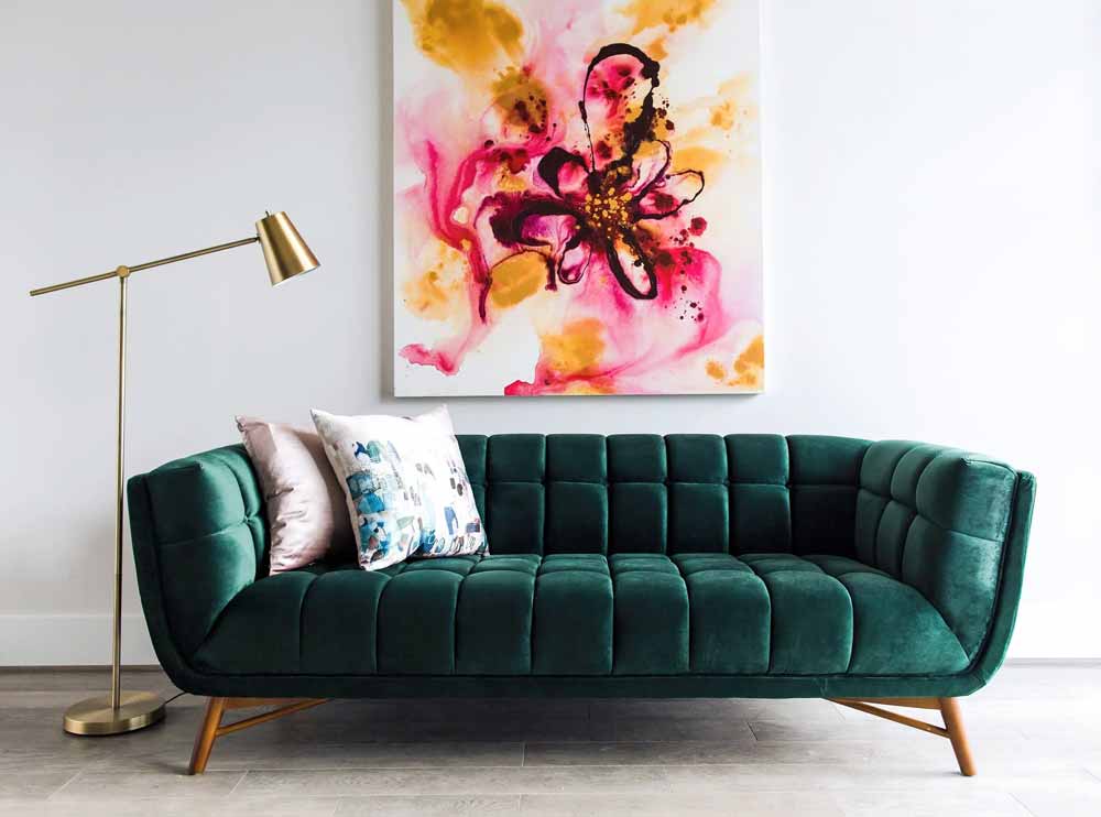 Mid-century modern green velvet sofa