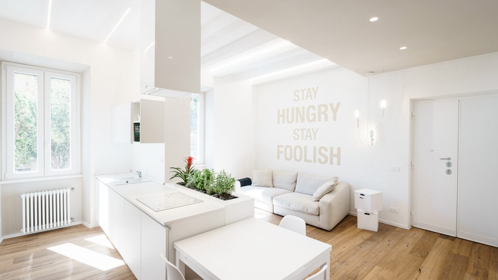 Minimalist apartment with allwhite interior in Rome by Brain Factory
