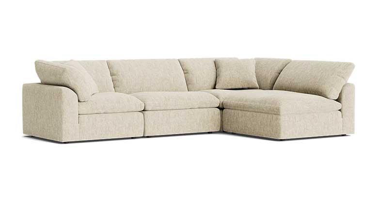 Modern cream L-shaped couch for sale - perfect for any living room (for holiday gatherings or a quick nap)