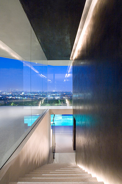 Modern architecture at its best: spectacular Hollywood Hills mansion overlooking the stunning Los Angeles nightlights 