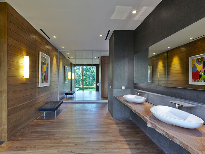 Modern bathroom in sophisticated modern Singapore home designed Robert Greg Shand Architects