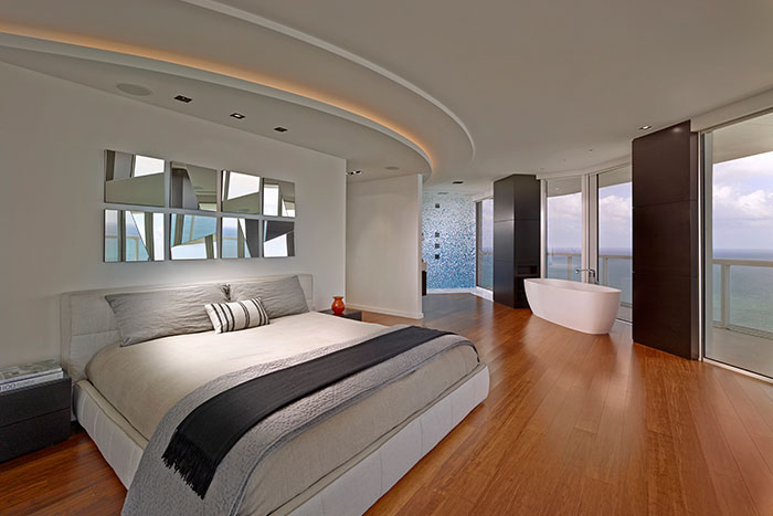 Modern bedroom in a breathtaking penthouse in Miami Beach, Florida by Pepe Calderin Design