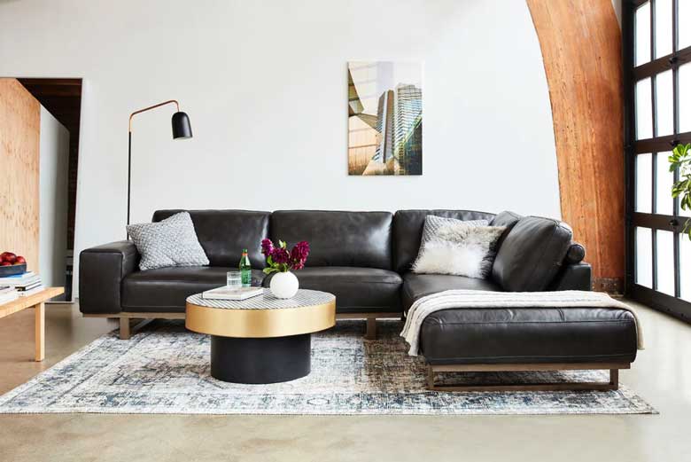 Modern black graphite leather sectional sofa with exposed pine wood frame