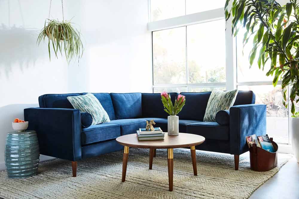 Small modern blue L-shaped couch | This corner sofa is perfect for small, medium and large spaces