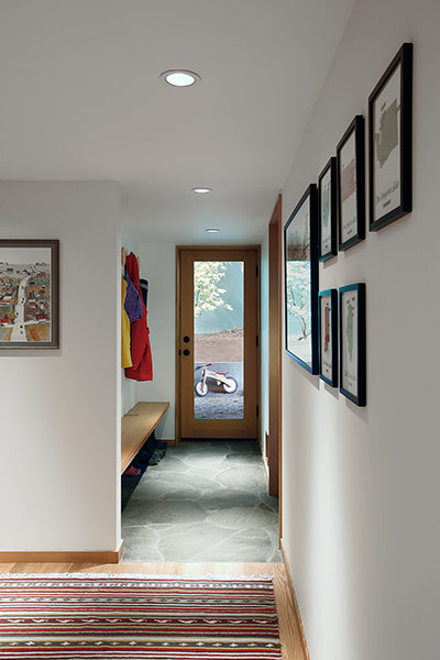 Modern corridor in remodeled 1967 house near Seattle by SHED Architecture 