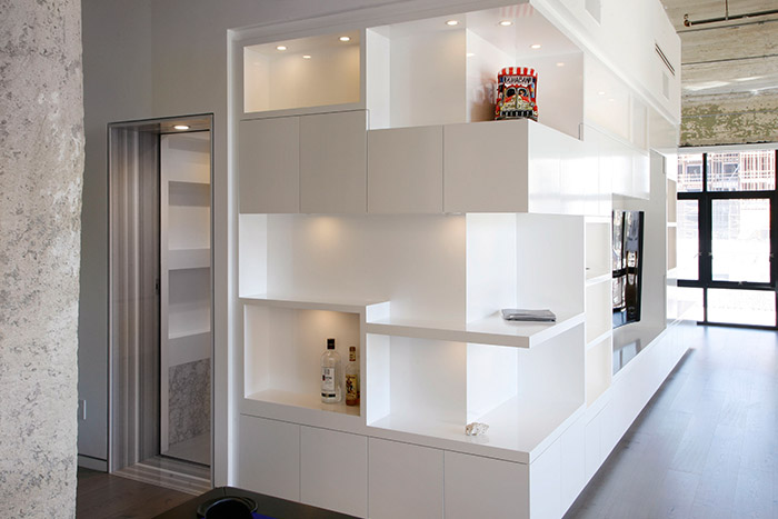 Minimalist furniture in modern Los Angeles twin loft by CHA:COL