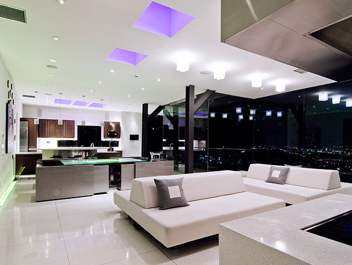 Modern living dining area in bachelor pad Harold Way Residence