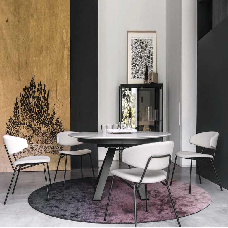 Modern round extendable dining table for sale