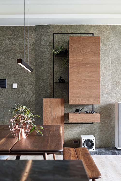 Modern furniture was chosen for the living area inside this small home located in Taiwan