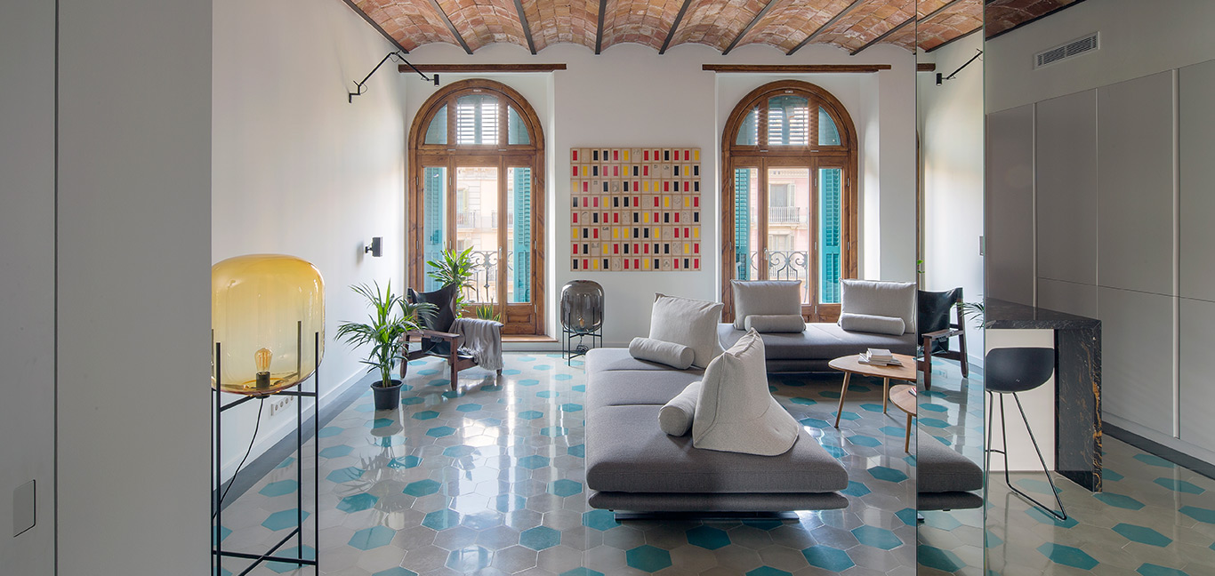 This stunning apartment in Barcelona designed by Nook Architects benefits from the use of mirrors to amplify space and light