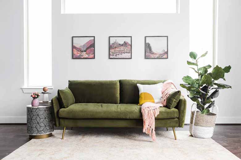 Modern olive green velvet sofa for sale - a great option for a stylish living room