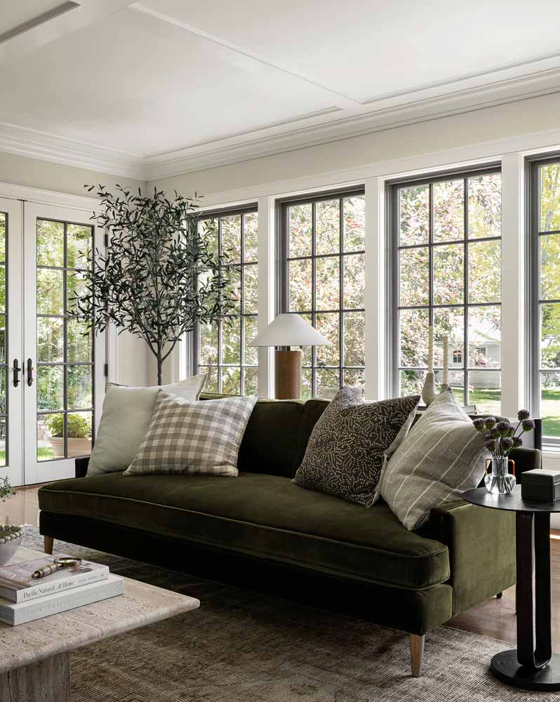 Olive green velvet couch with minimal arms | Olive green velvet sofa that brings modern simplicity to any living room decor