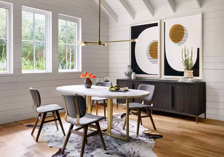 White marble oval dining table with brass-finished iron base for sale