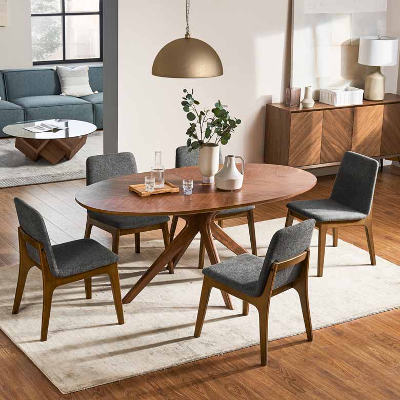 Oval dining table for sale with walnut tabletop and solid wood legs
