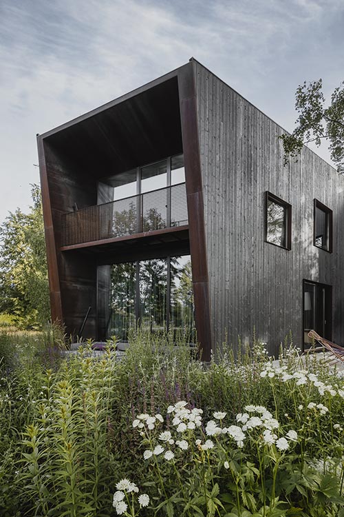 Architects' House by Open AD: Modern timber house in Latvia