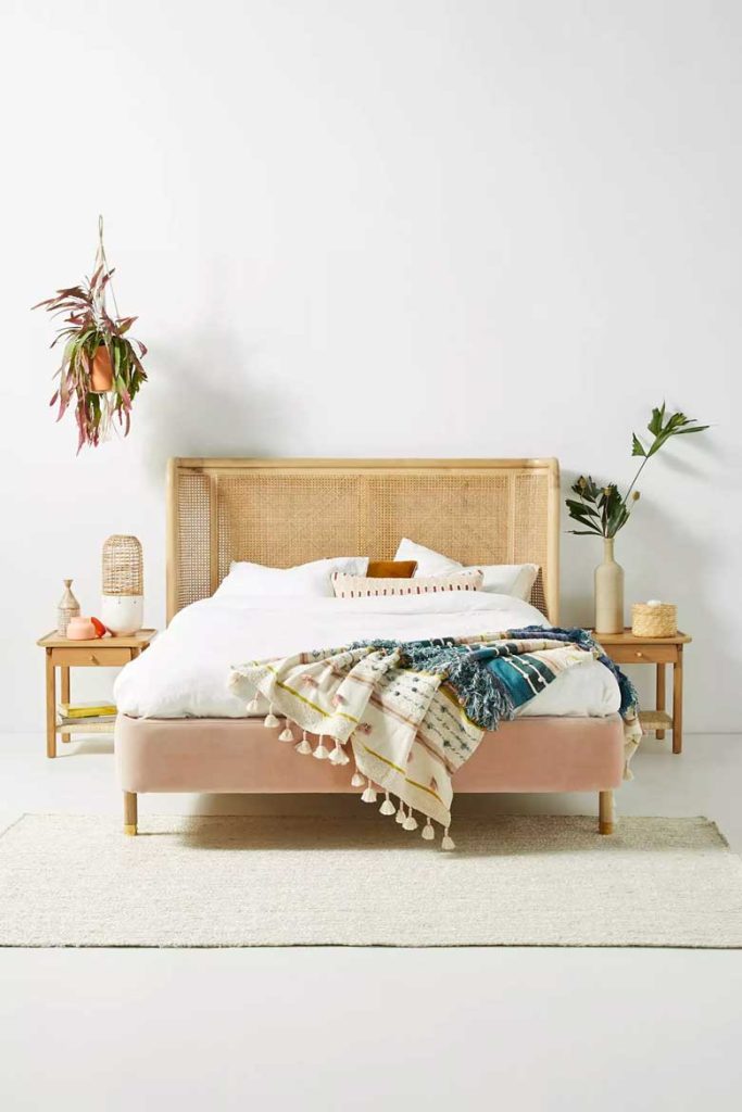 Rattan bed with curved headboard