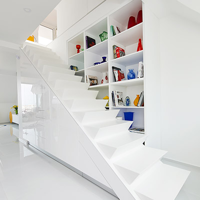 White staircase in renovated apartment located Budapest, Hungary