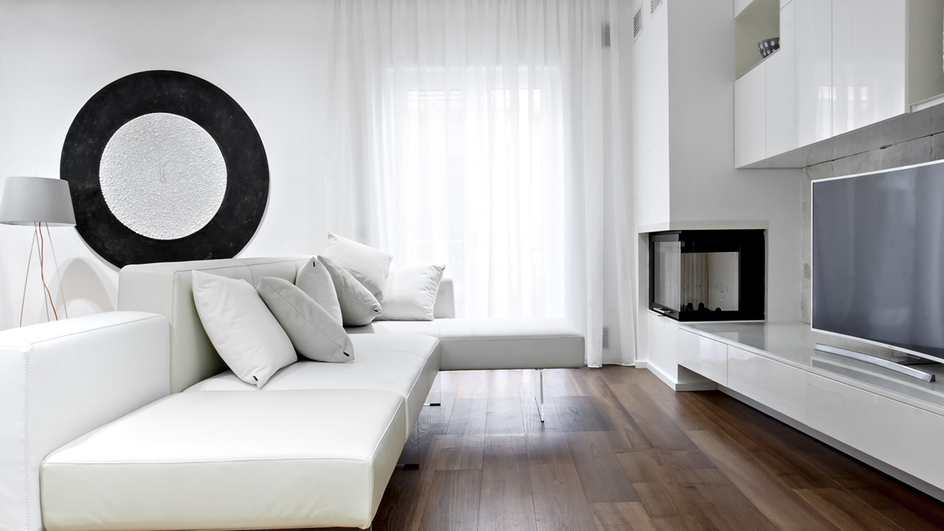 This renovated apartment in Italy boasts elegant black and white palette and custom cabinets