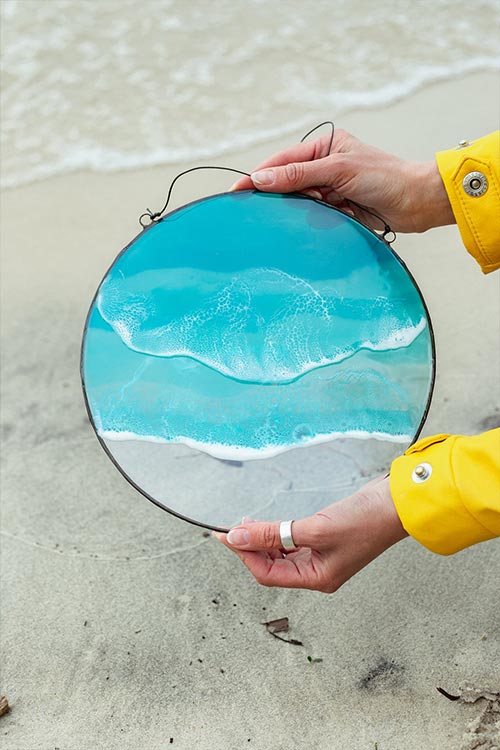 Round resin wall artwork by Anna Paschenko - wave-like patterns