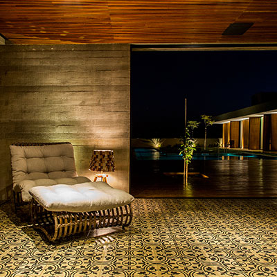 Stylish modern chair inside single-family house near Sao Paulo, Brazil - design by mf+arquitetos