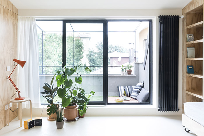 Beautiful terrace of small 28 square meter apartment in Milan, Italy designed by Studio WOK