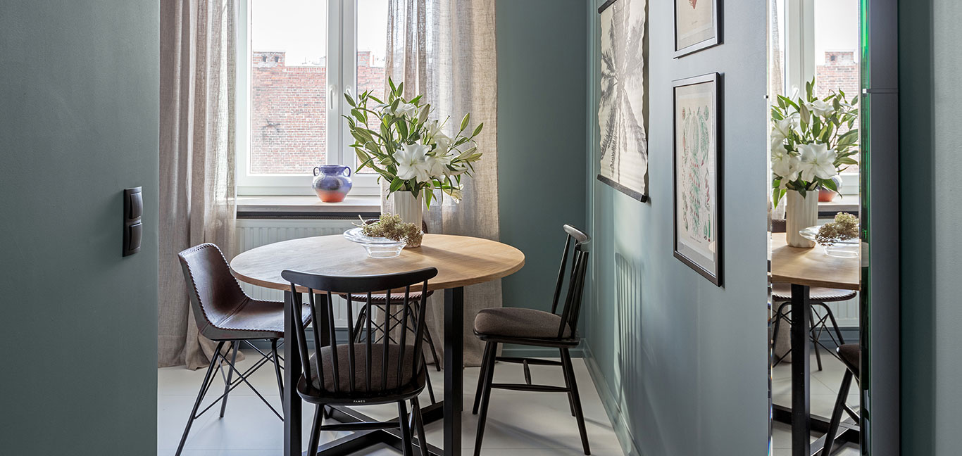 Stylish color palette chosen for modern living room completes small apartment renovation in Warsaw, Poland by Finchstudio