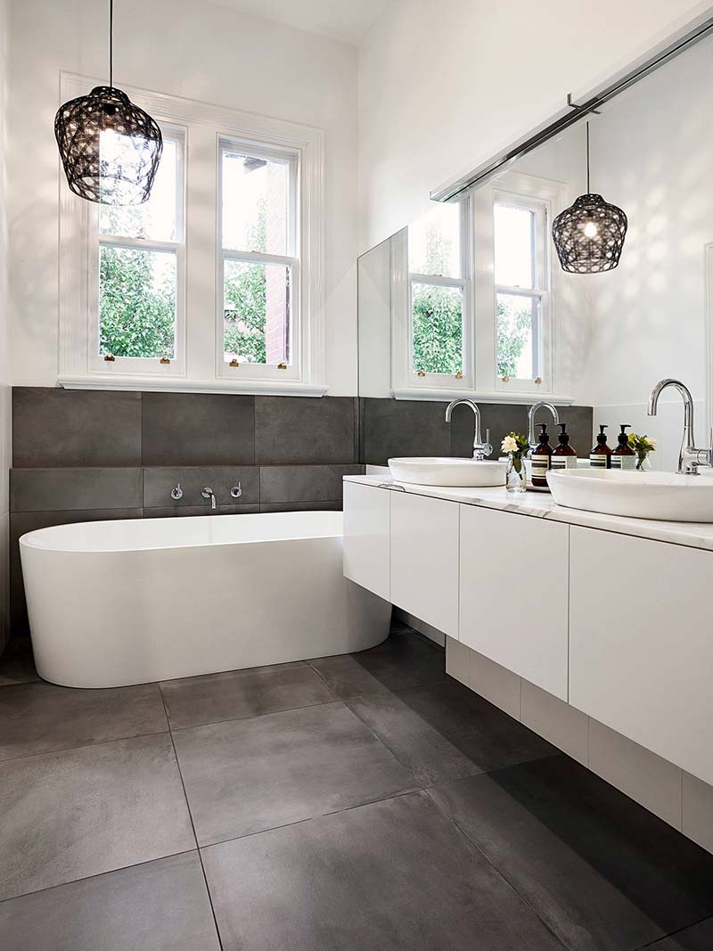 Use large floor tiles to make your small bathroom look larger