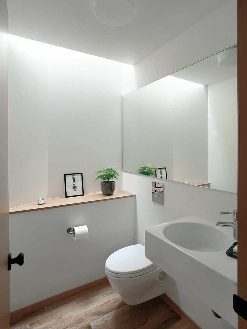 Small bathroom ideas - add a large mirror to make your bathroom look larger than it is