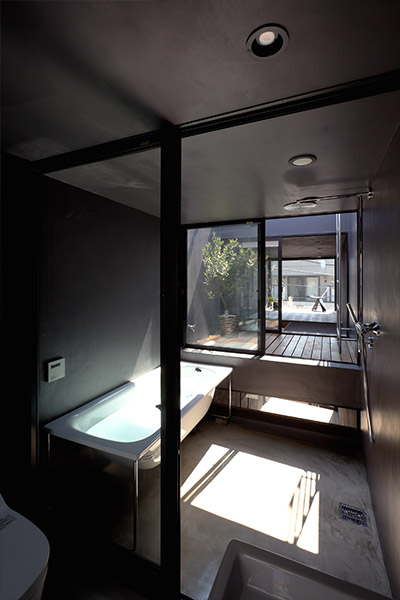Small bathroom design idea in an extremely narrow 1.8m house in Tokyo, Japan by YUUA Architects 