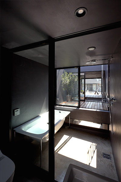 Small bathroom design idea in an extremely narrow 1.8m house in Tokyo, Japan by YUUA Architects