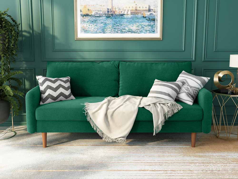 Green velvet sofa / couch, perfect for modern homes