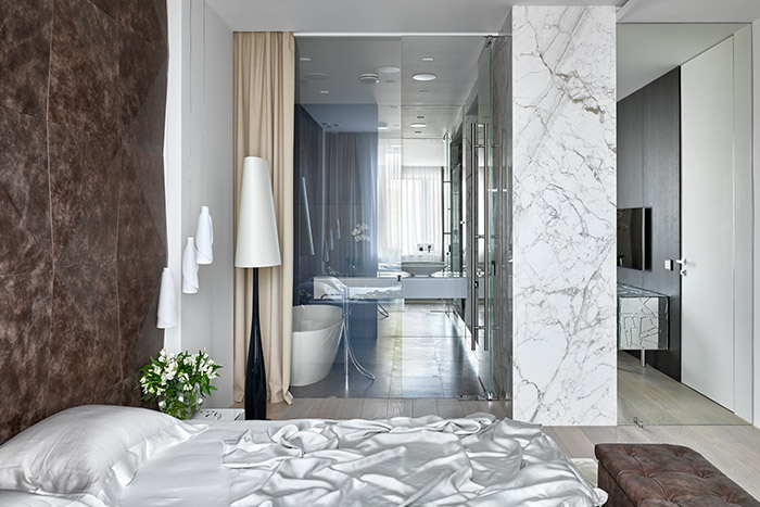 Master bedroom with amazing ensuite bathroom exudes air of sophistication - part of a comfortable apartment in Moscow, Russia designed by Alexandra Fedorova