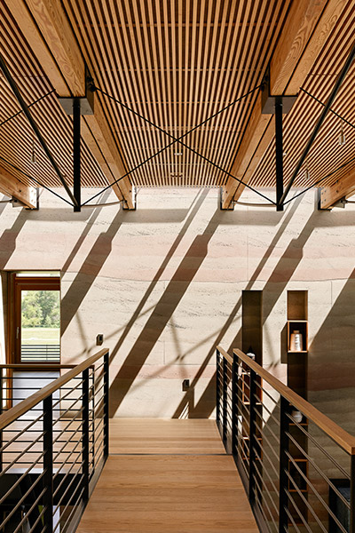 Spring Ranch by Feldman Architecture: Modern staircase that leads to the private areas of the house