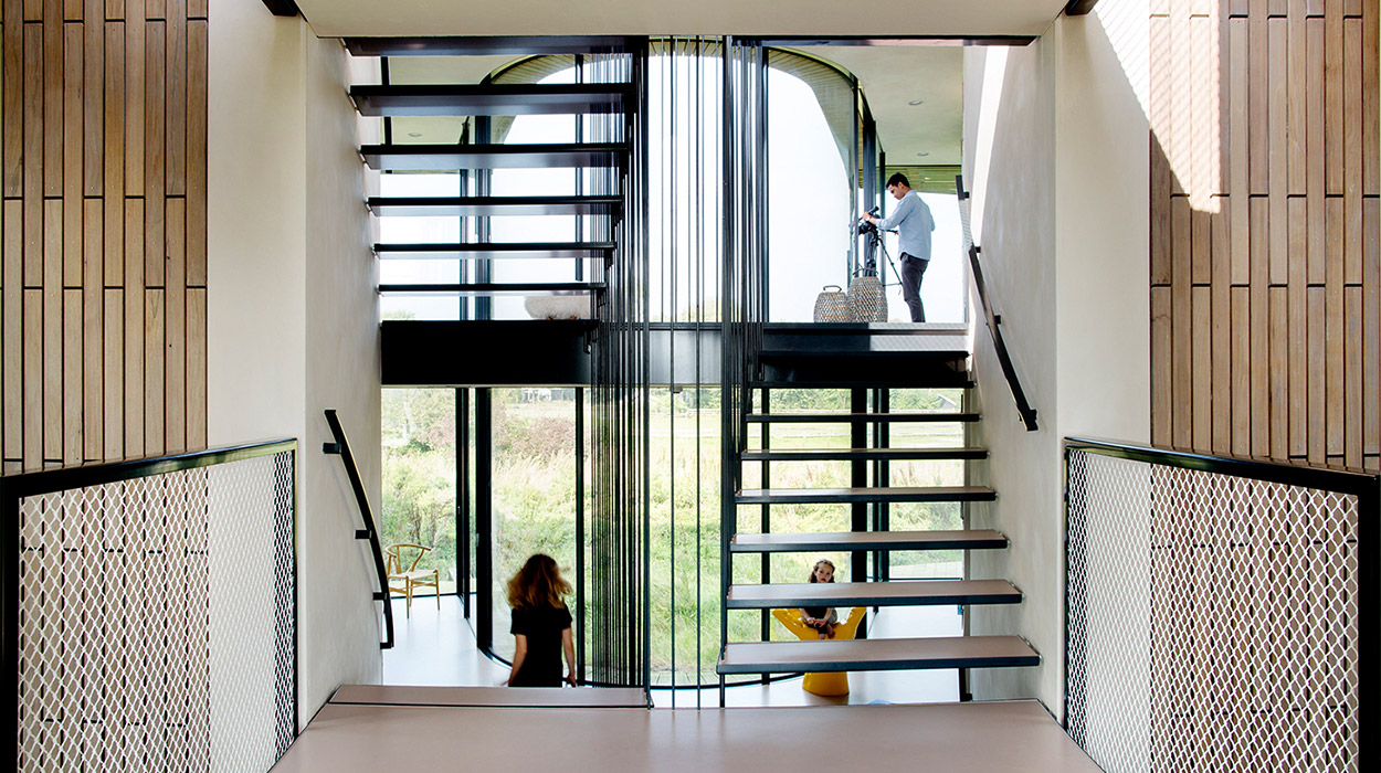 Modern staircase in contemporary smart home in The Netherlands by UNStudio